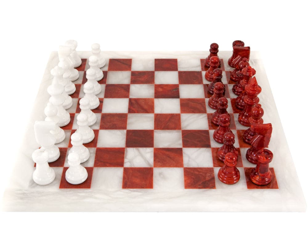 Red and white alabaster chess set handmade in Italy, featuring a polished 14.5-inch board with unique natural textures and luxury design.