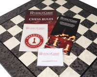Chess rules and warranty documents on a 20-inch grey Erable chess board