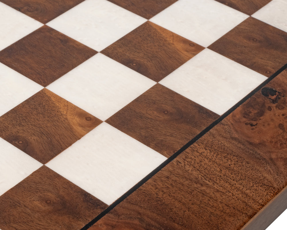 Close-up of a 17-inch dark walnut and elmwood luxury chess board, featuring its elegant wood grain and polished finish.