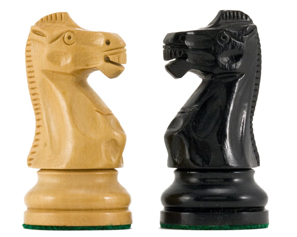 Supreme Series Ebony Staunton chess knights in ebony and boxwood, crafted with classic design, weighted and felted bases.