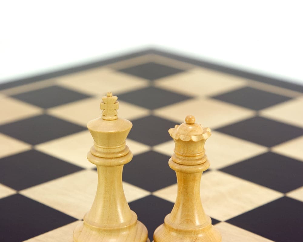 Windsor Series Ebony Staunton Chess Pieces on black-and-white board, 3 inch king, classic Staunton design, detailed wooden chess pieces.