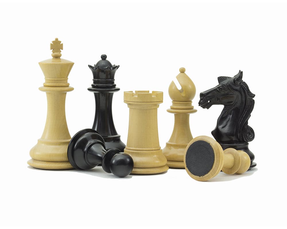 Columbus Series Chessmen Ebony 4" Staunton design, handcrafted, weighted, with 4 inch King and two additional Queens, ideal for 21.7 inch board