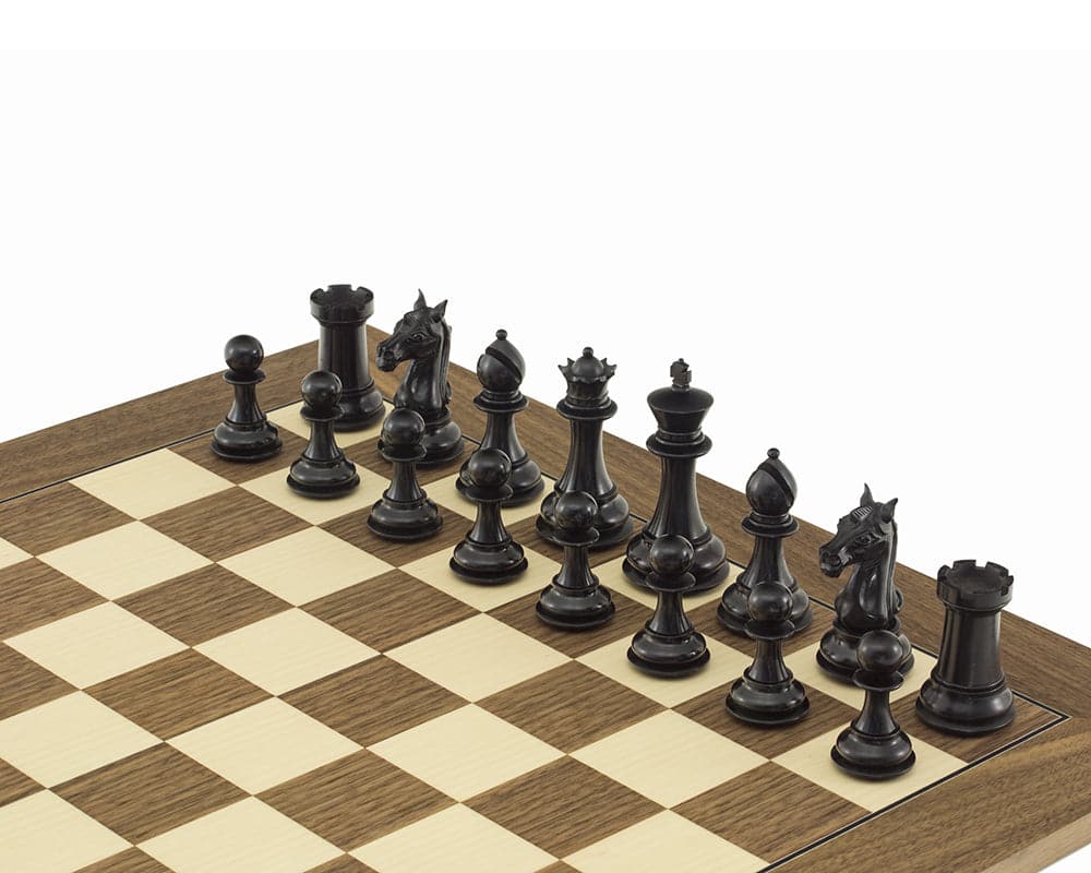 Columbus Series Chessmen Ebony 4" set up on chessboard, showcasing decorative Staunton design, expertly crafted from ebony, with 4 inch King.