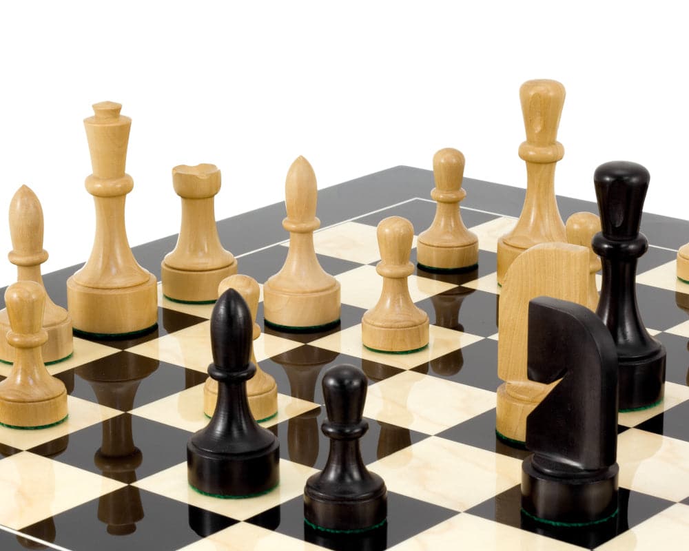 Contemporary Black Anegre Chess Set with handcrafted boxwood pieces on high gloss lacquered board with maple accents