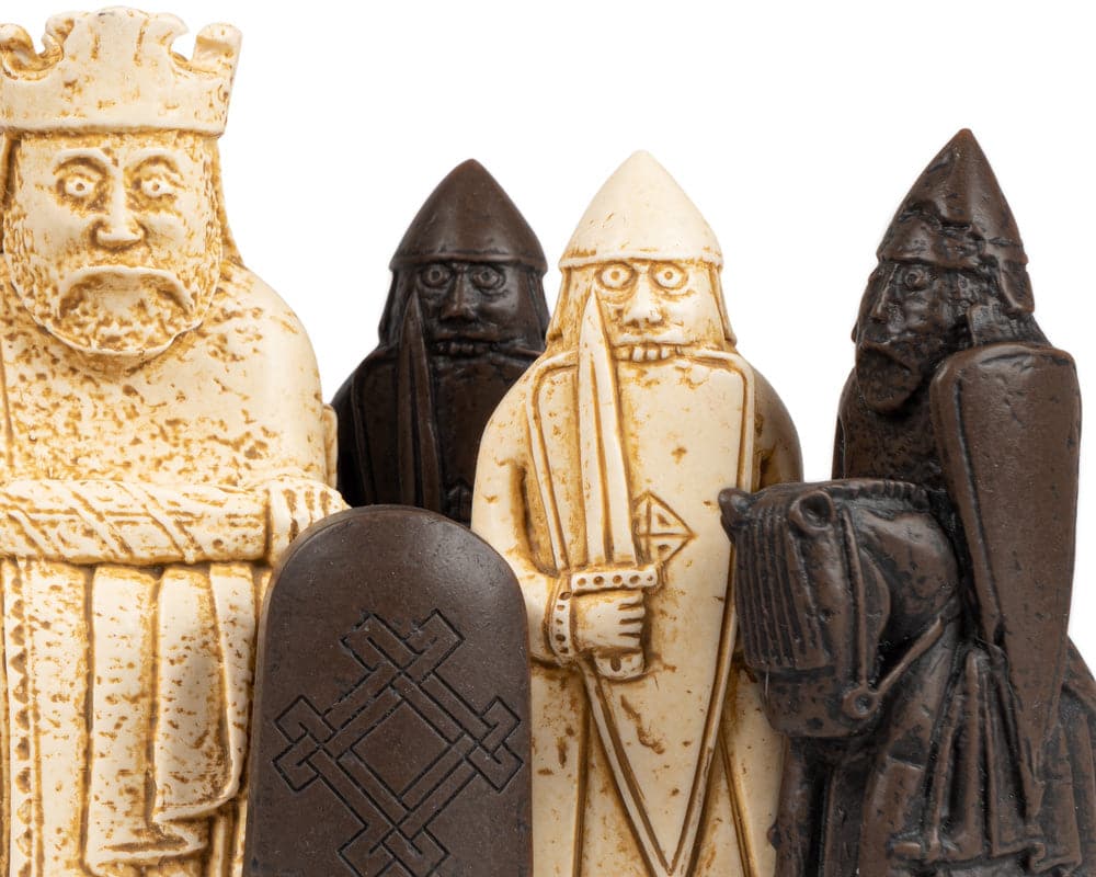 Isle of Lewis chess set pieces close-up featuring finely crafted historical chessmen