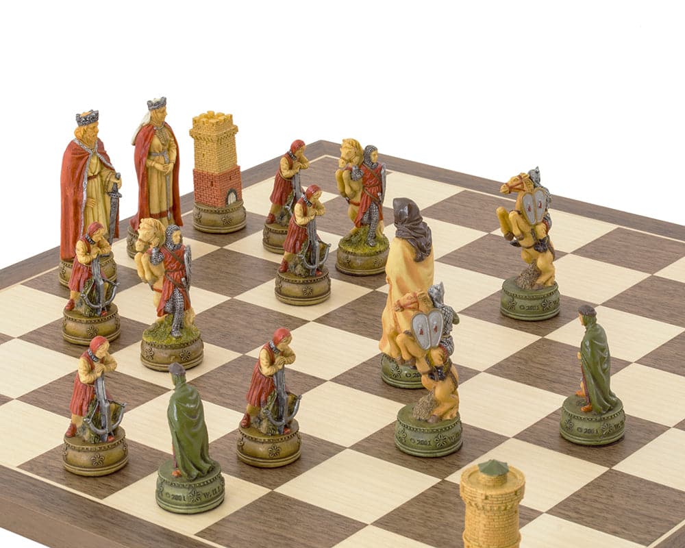 Camelot Hand Painted Chess Set by Italfama with intricately detailed themed pieces on a brown and white chessboard.