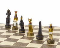 Hand-painted Ancient Egypt themed chess pieces by Italfama on walnut and maple board, featuring Egyptian characters and artifacts.