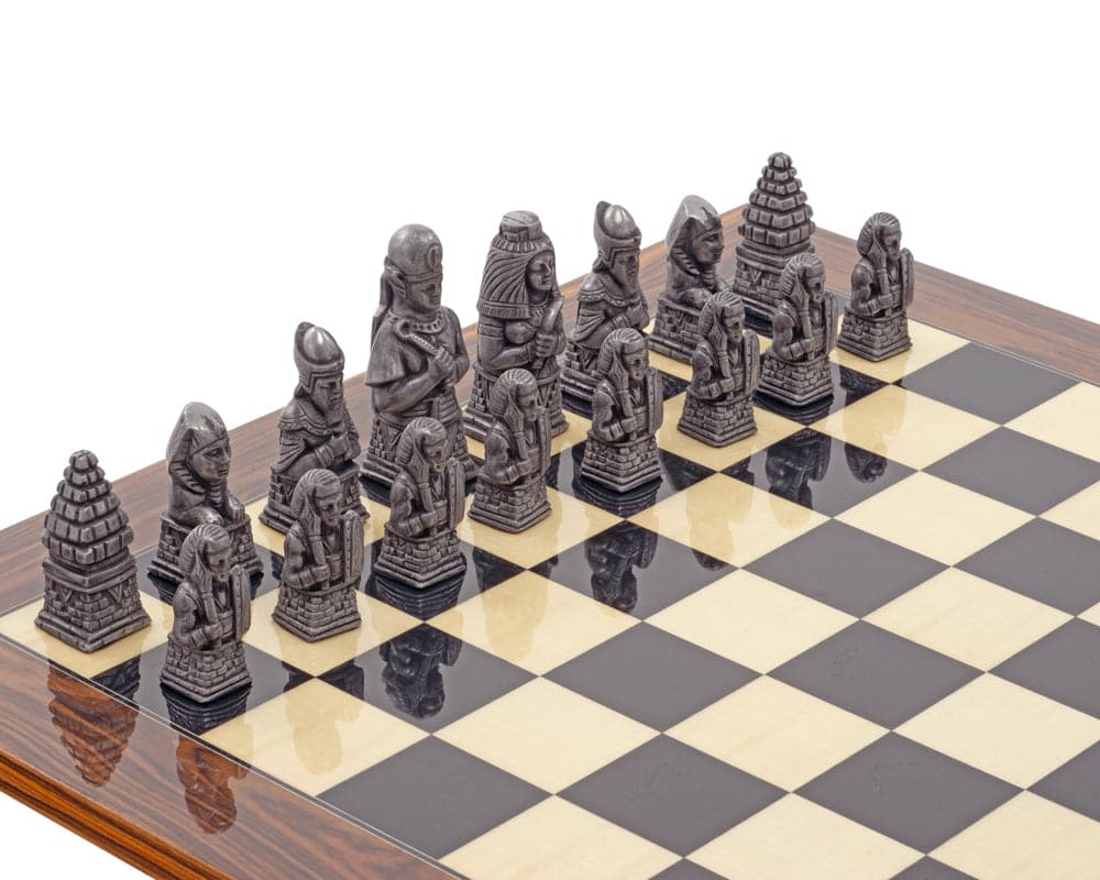 Egyptian Metal and Palisander Chess Set with intricate pieces on a chessboard.