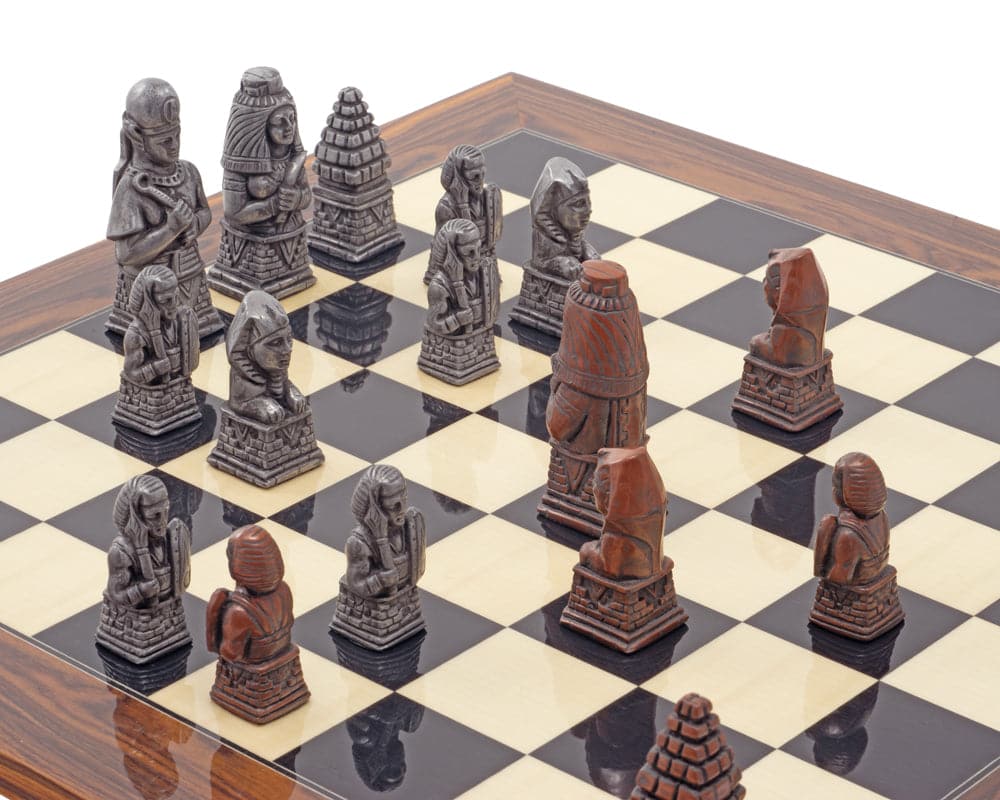 Egyptian Metal and Palisander Chess Set with intricately designed pieces on a wooden chessboard, showcasing an ancient Egyptian theme.