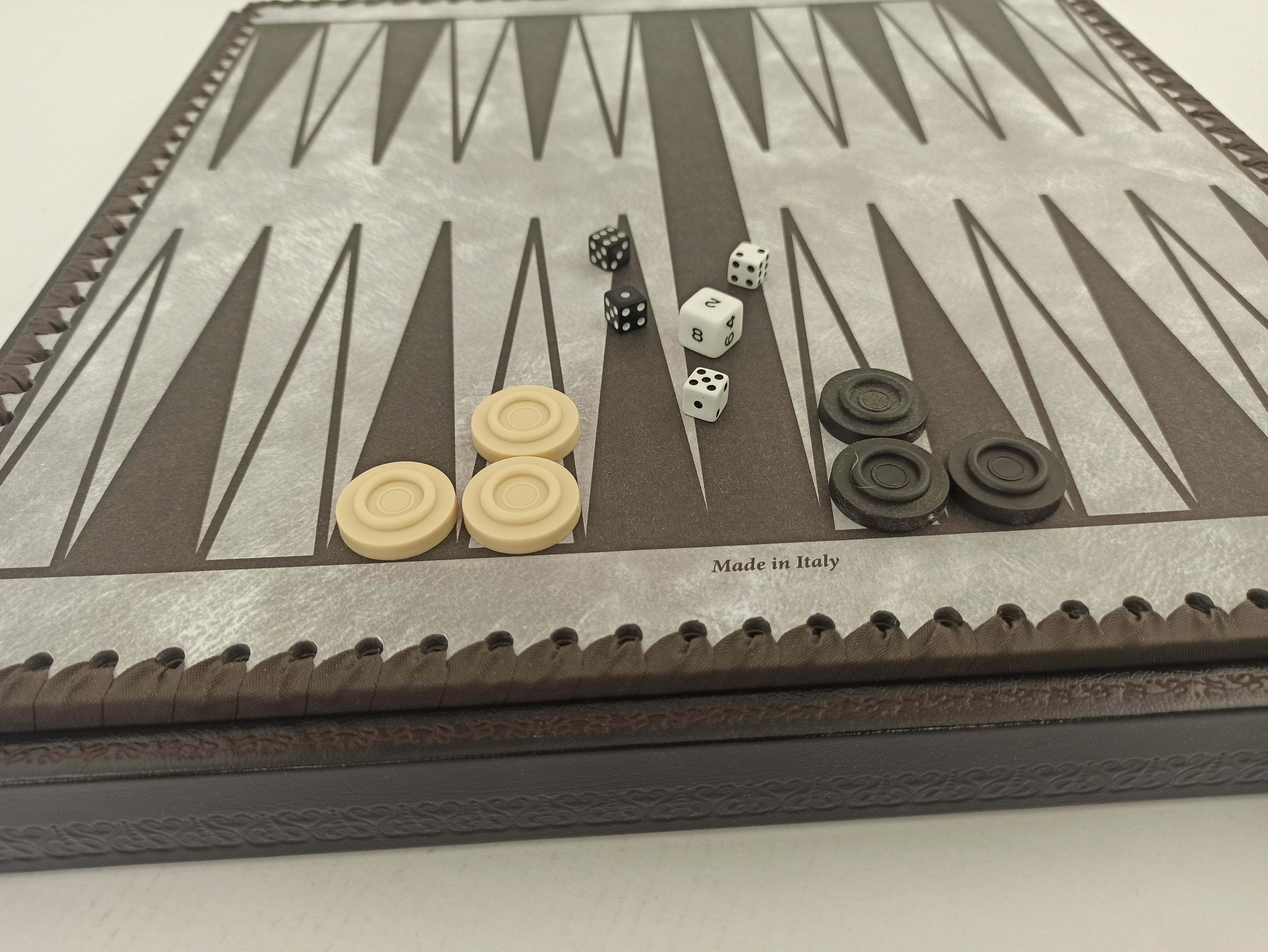 High-quality Italian Backgammon board with white and black pieces and dice, beautifully crafted with attention to detail.