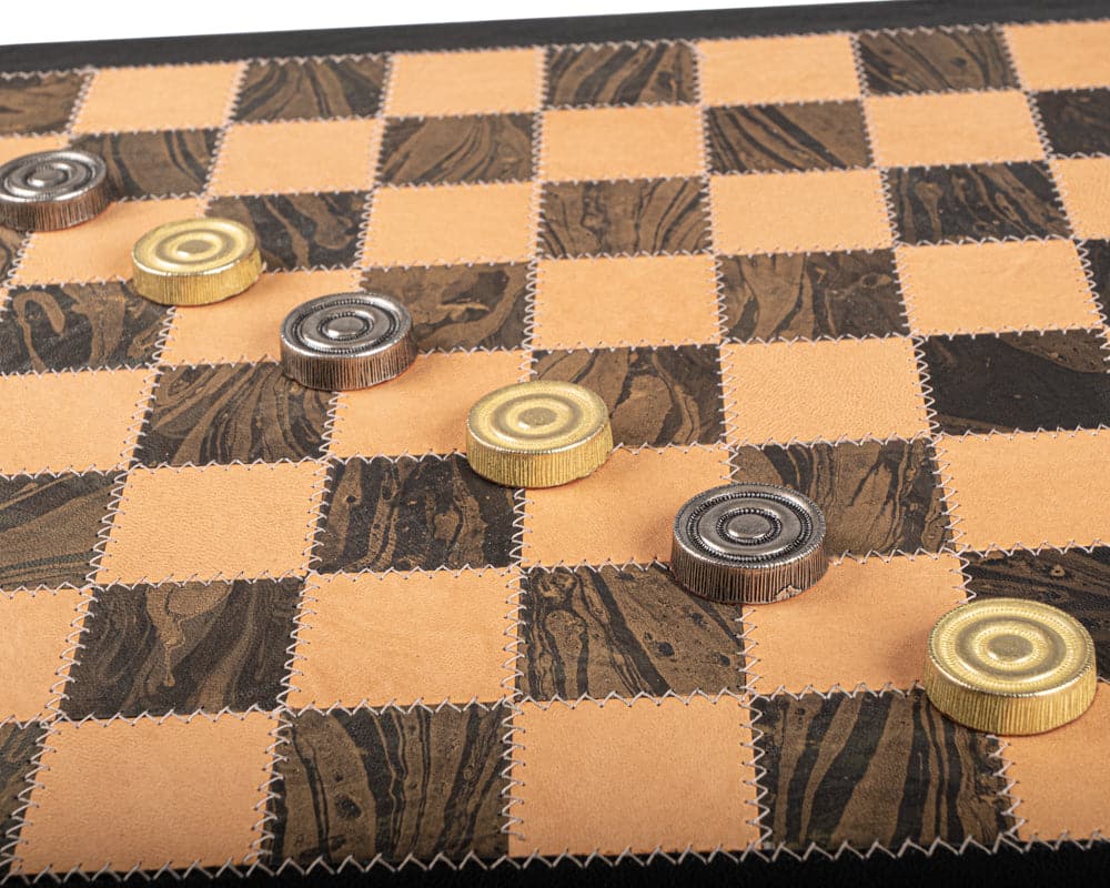 Luxury leather and metal draughts set by Italfama, featuring a wooden cabinet and high-quality crafted pieces on a checkered board.