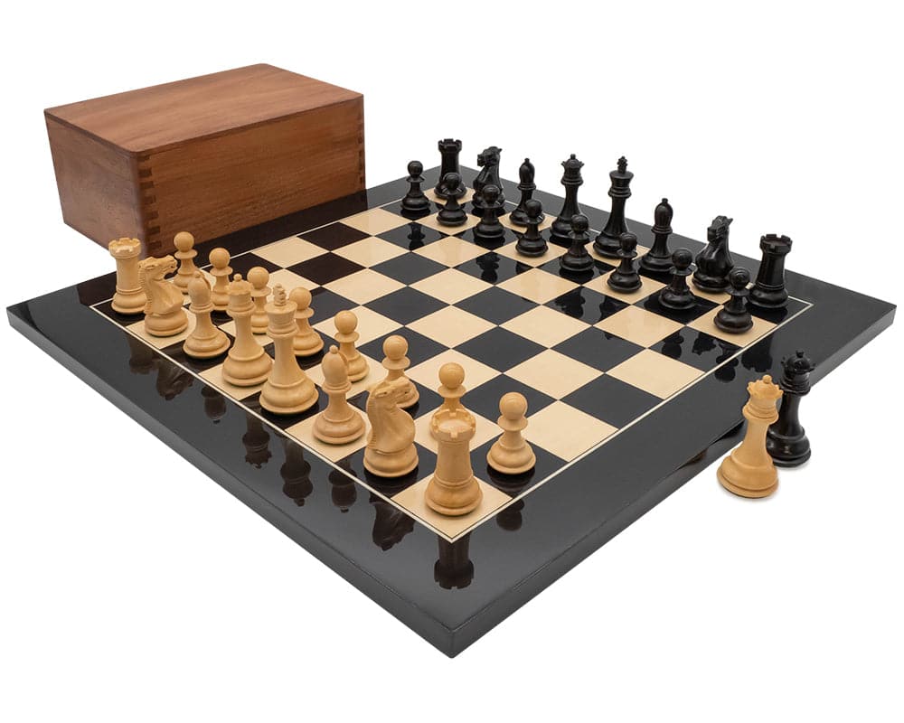 Luxury Staunton Competition Chess Set with wooden case on black and beige chessboard.